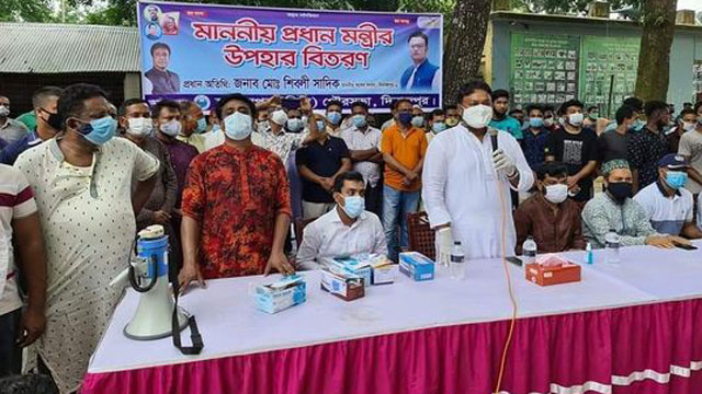 হিলিতে ৩০৮১ টি পরিবারের মাঝে ভিজিএফের চাল বিতরণ